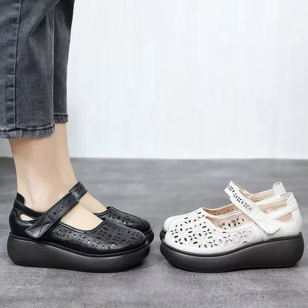 Nuevos zapatos de cuero huecos de suela gruesa
