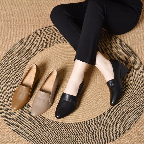 Zapatos de piel de tacón bajo con cuña