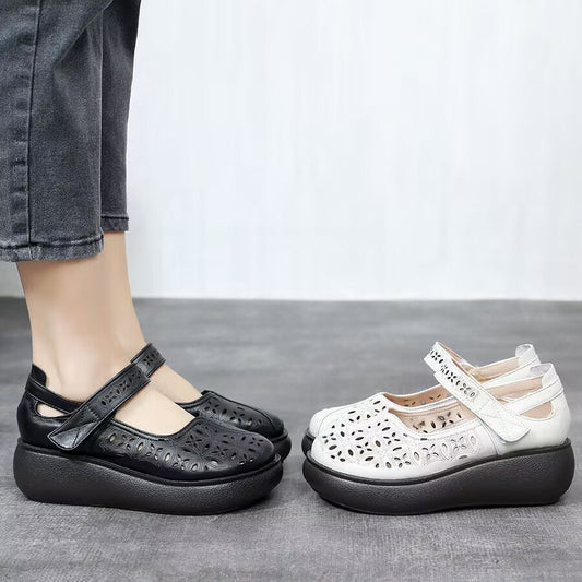 Nuevos zapatos de cuero huecos de suela gruesa