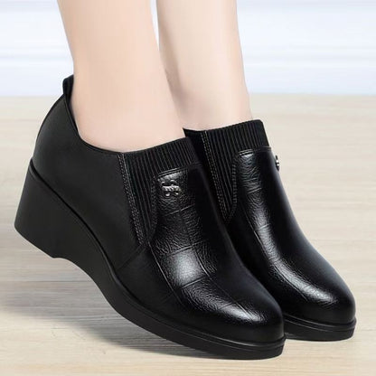 Zapatos cuero con tacón de cuña