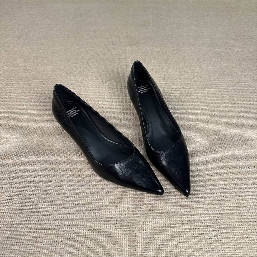 Zapatos de piel de punta afilada con tacón