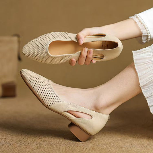 Zapatos de cuero huecos con suela