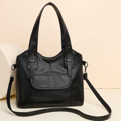 Bolso bandolera moderno de piel