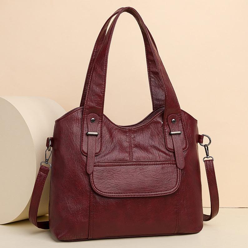 Bolso bandolera moderno de piel