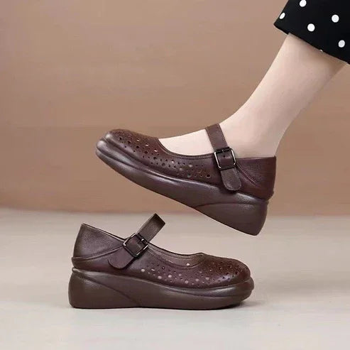 Crocs de punta redonda de cuero genuino